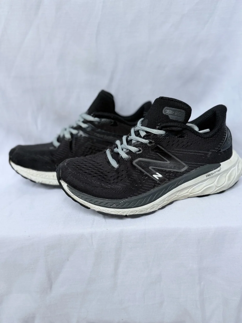 New Balance Black Sneakers with Light Blue Laces